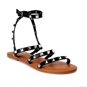 Never worn, size 7 black studded sandals